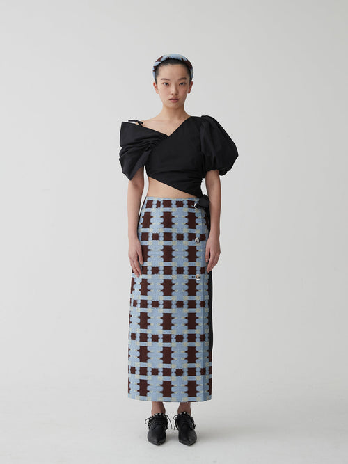 ASYMMETRIC VOLUME TOP