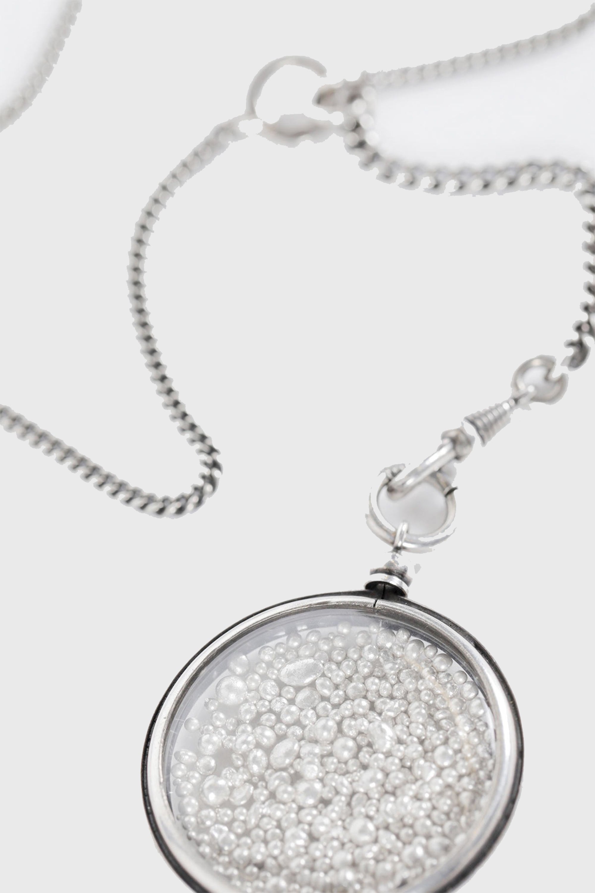 ANN DEMEULEMEESTER - ELSU MEDAILLON NECKLACE FILLED WITH LITTLE