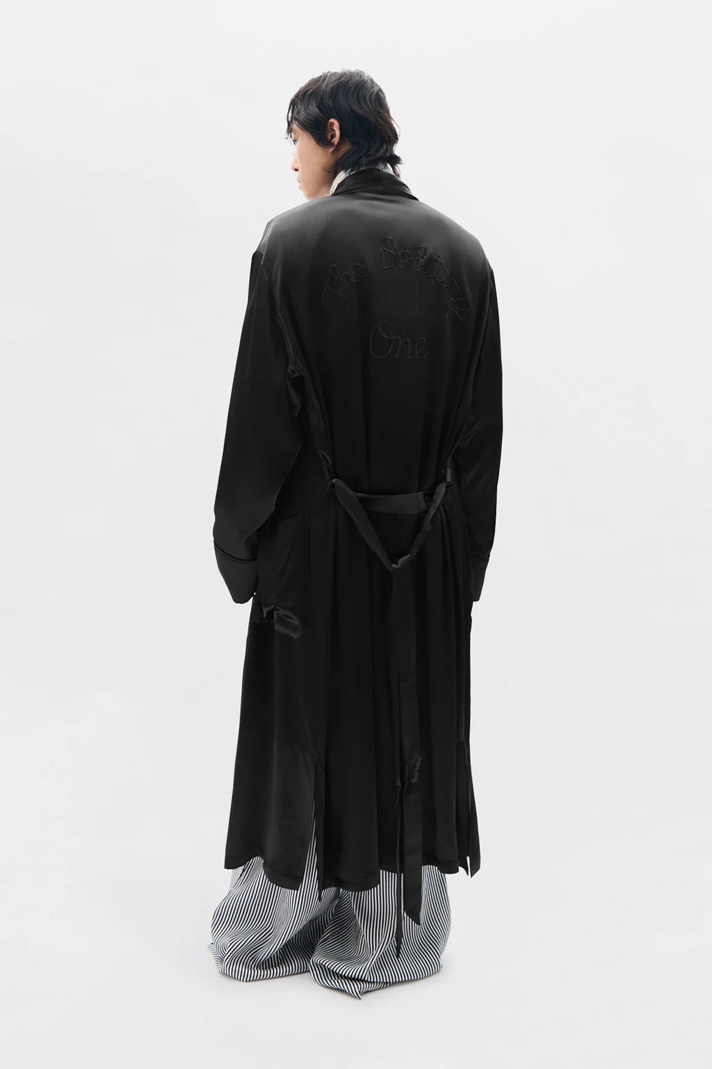 VORM FLUID BELTED LOUNGE COAT WITH "THE SOLITARY ONE" EMBROIDERY ON BACK BLACK